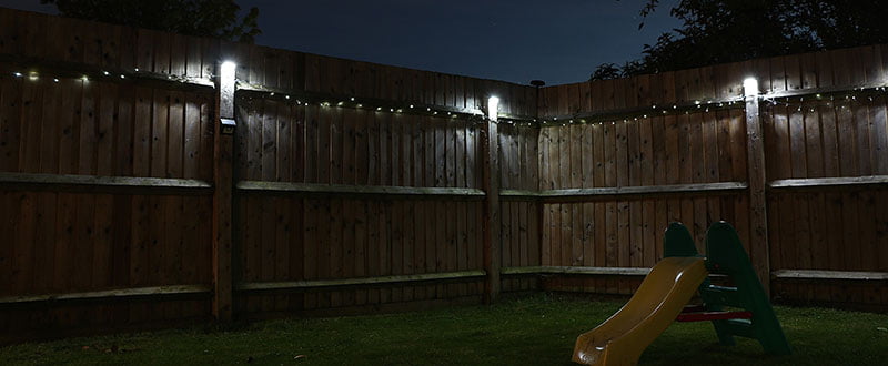 christmas lights on fence