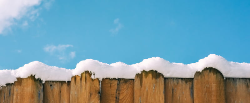 Fence with snow on