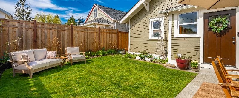 relaxing garden furniture in summer garden